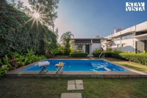 Serene Garden by VEO - Part of StayVista with Pool and Lawn area
